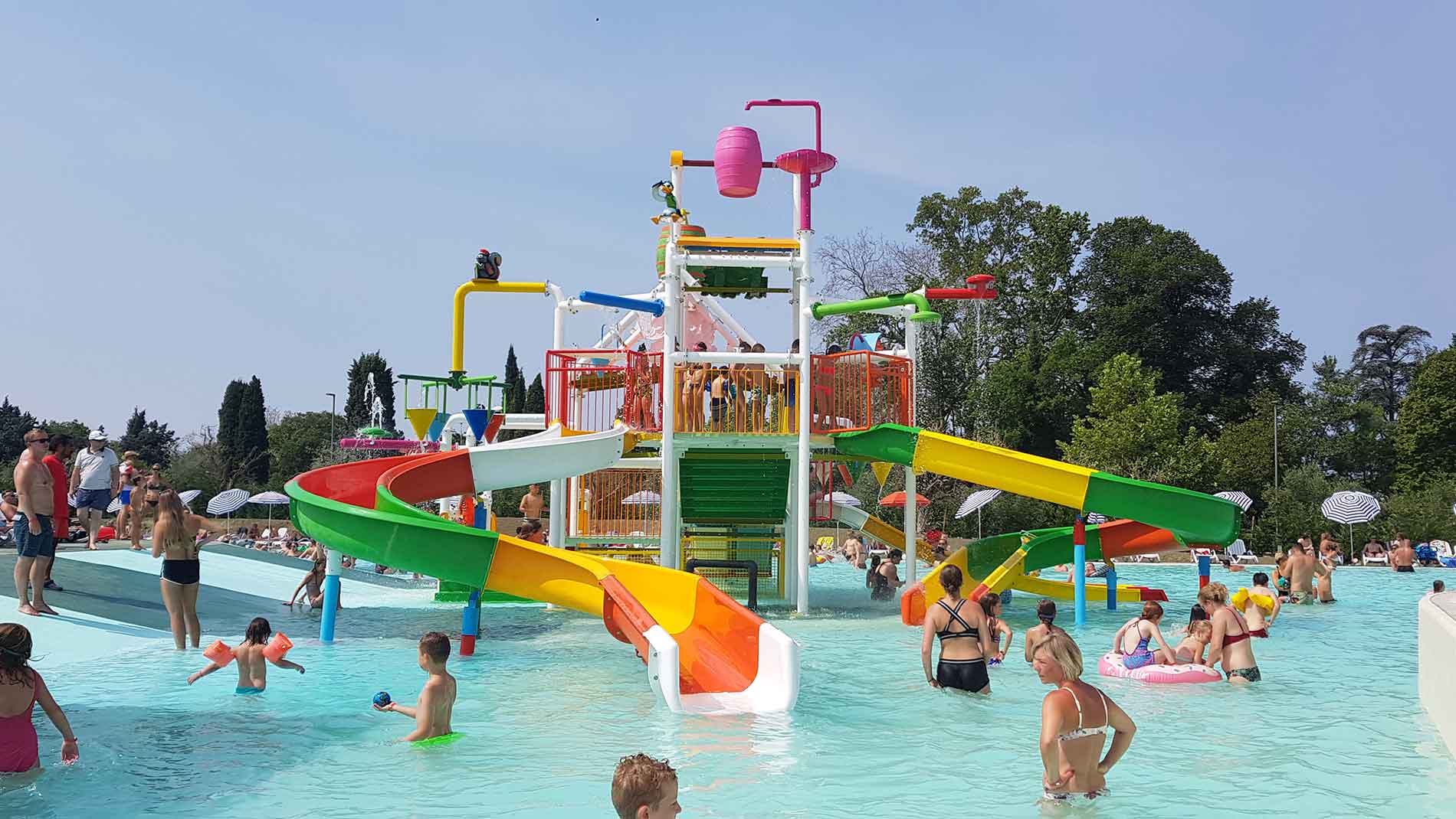 Water park with water slides and people